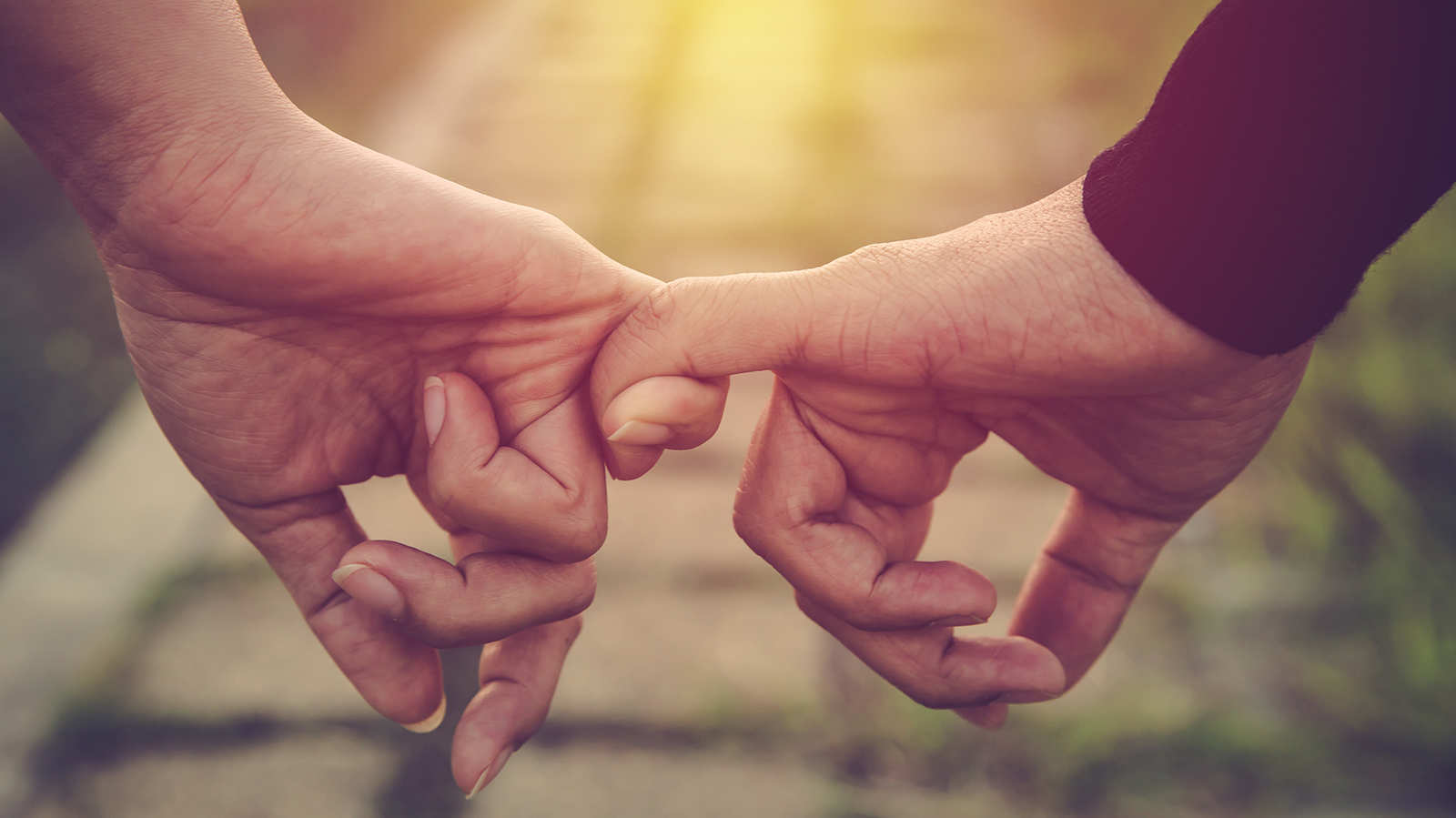 Overcoming doubt, distance and illness, three couples tell us how love conquers all
