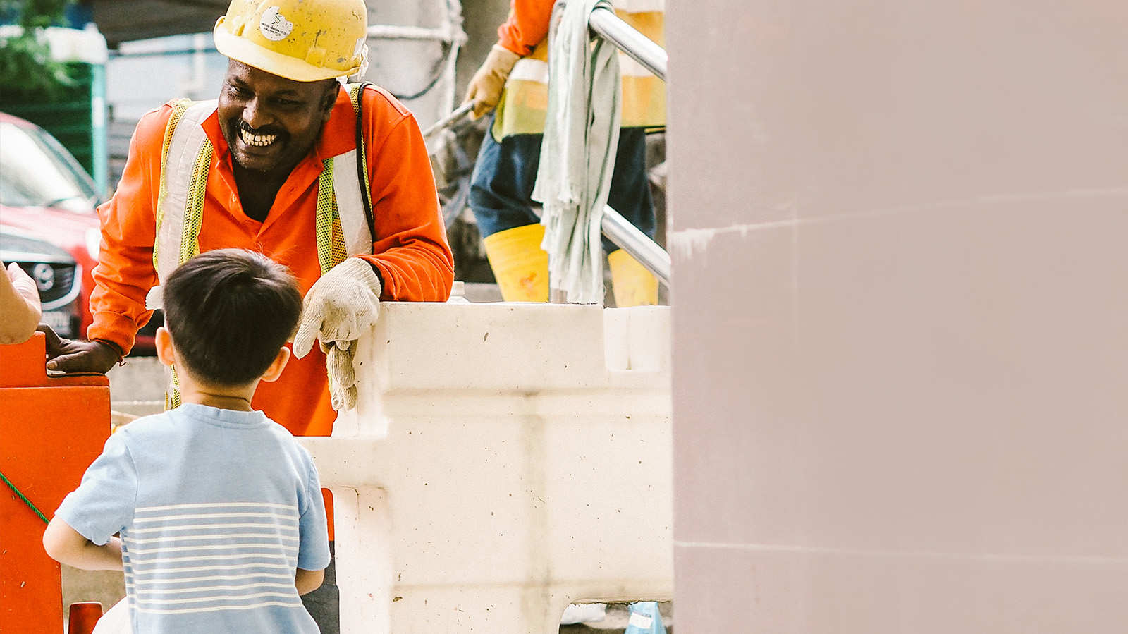 Three-year-old toddler is migrant workers’ best friend