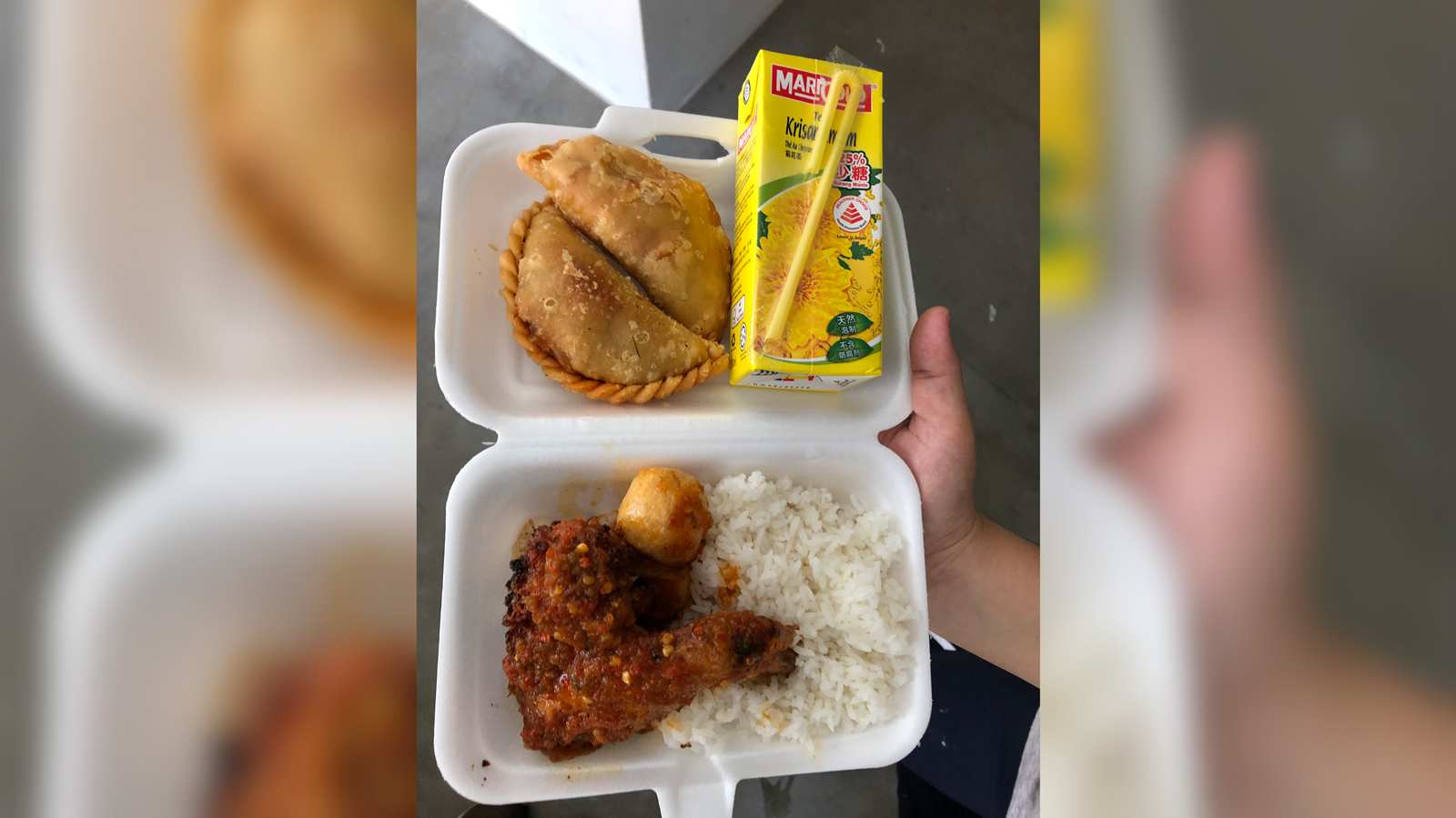 She gave away over 300 packets of Nasi Ayam Penyet because she knows what it’s like to be poor