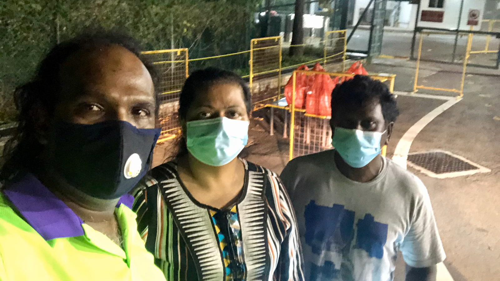 Volunteers deliver meals to migrant workers in dormitories in the darkest hours of the night amid Covid 19